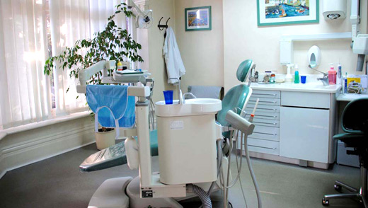 A photo of our surgery showing the dentist chair and high-tech equipment